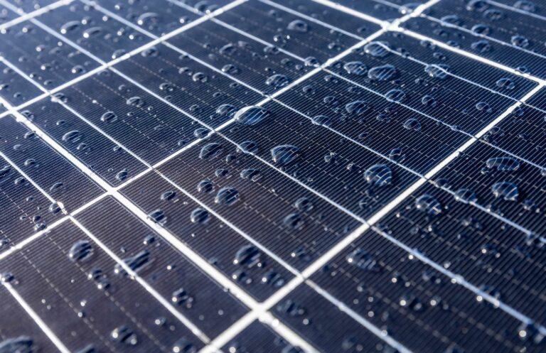 Water droplets on a solar panel for the post: Solar Panel Cleaning - PSW Energy